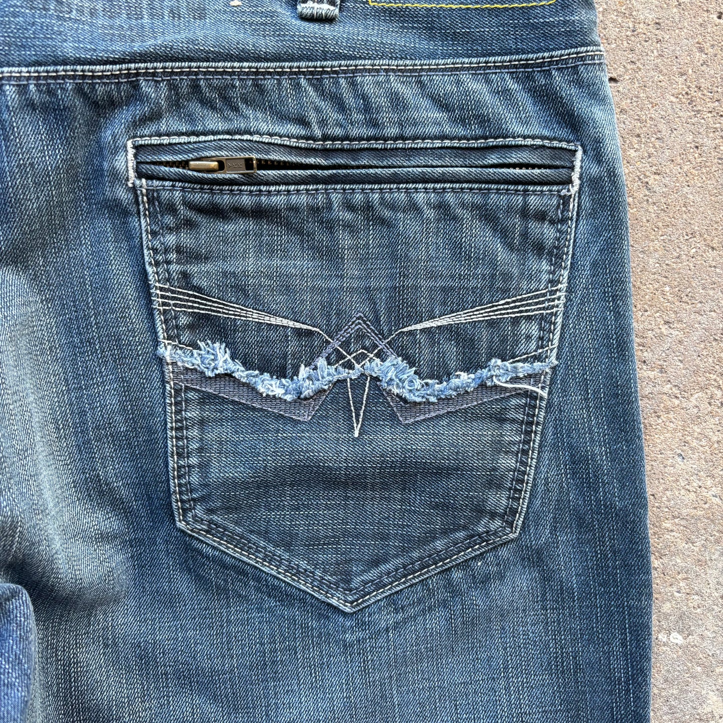 DKNY Grunge Style Jeans with Back Pocket Stitching